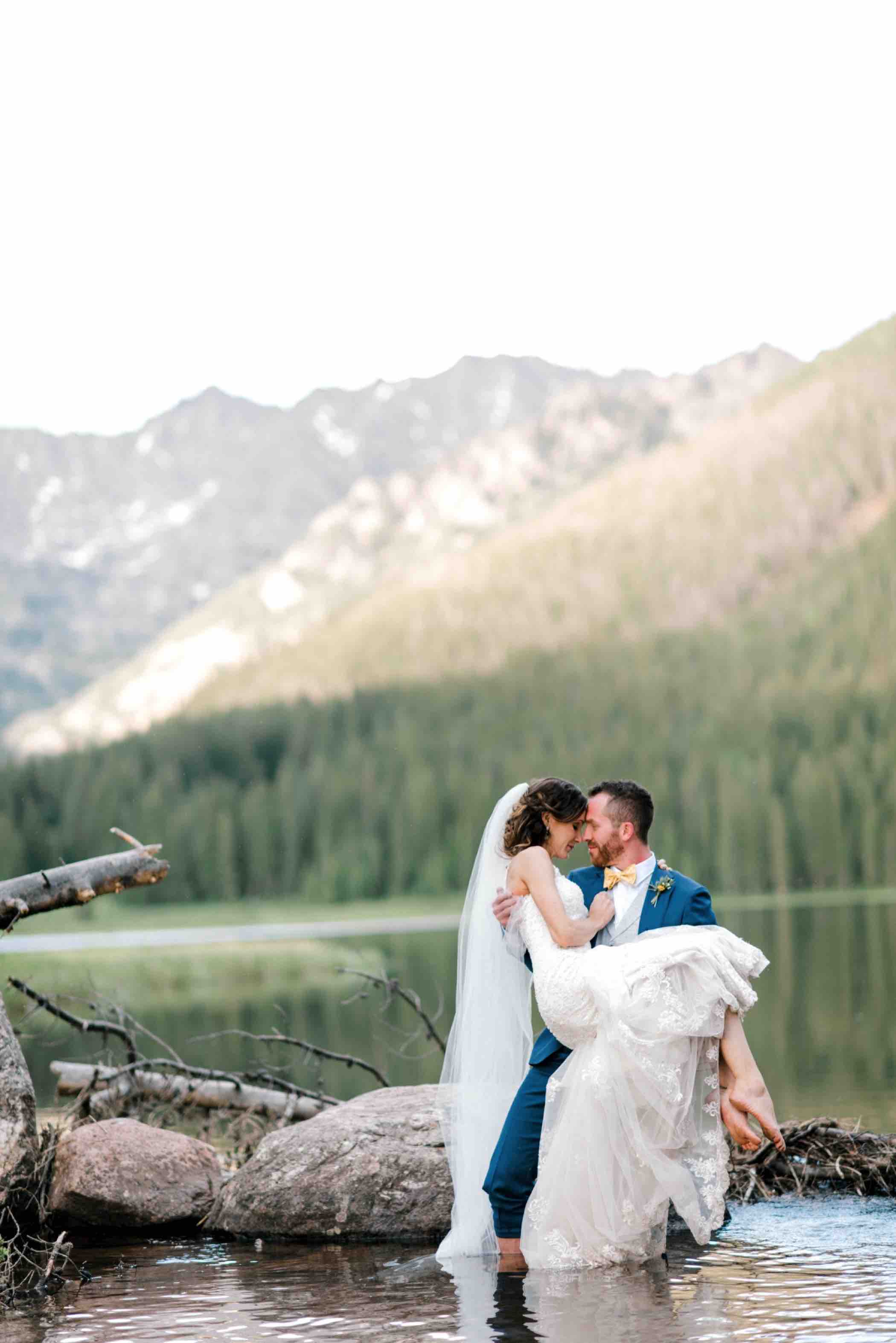 Bride and groom water portraits at Piney River Ranch in Vail, Colroado. Photo by Ali and Garrett, Romantic, Adventurous, Nostalgic Wedding Photographers.