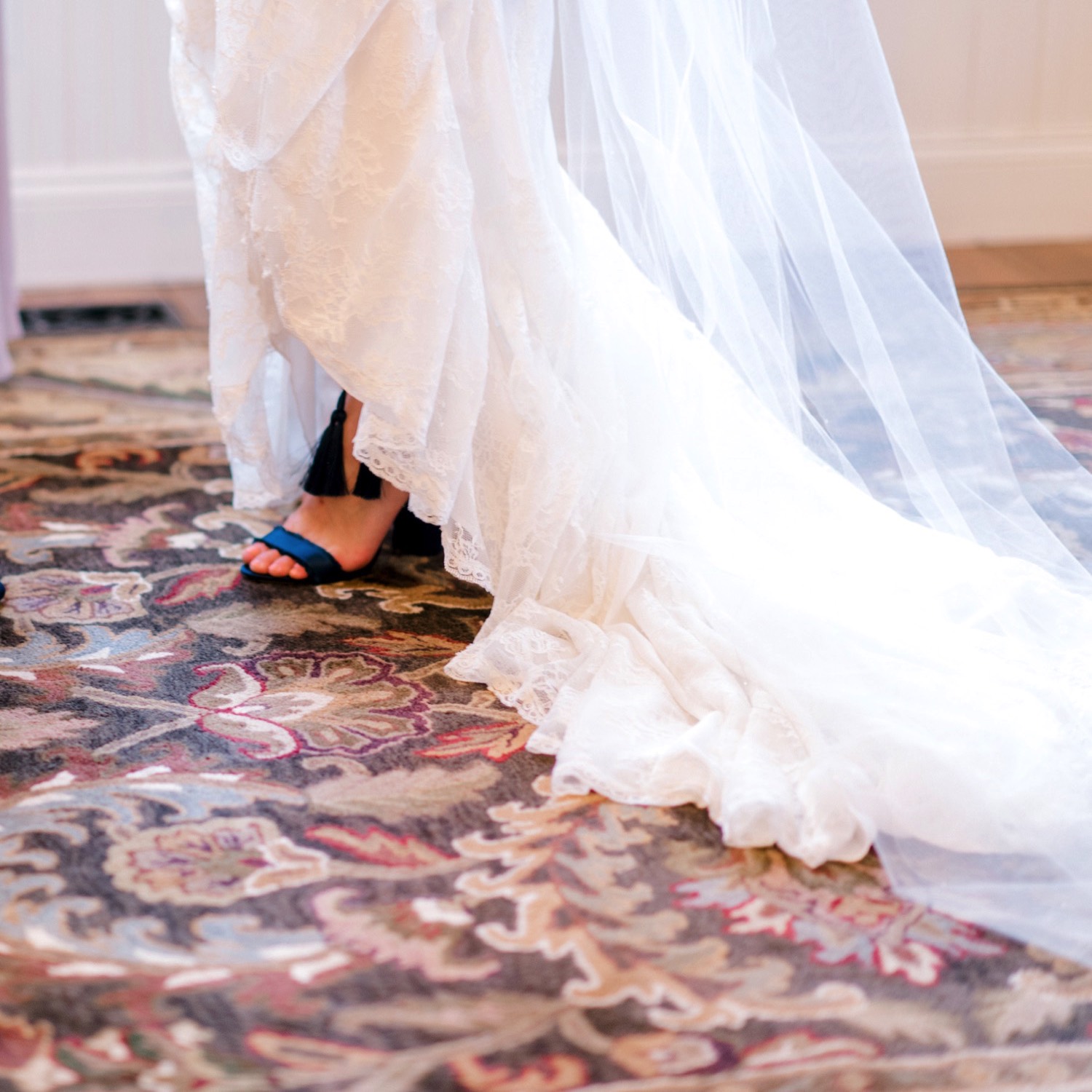 Kristen, the bride, wore bright blue heels for her wedding at Spruce Mountain Ranch in Larkspur, Colorado. 