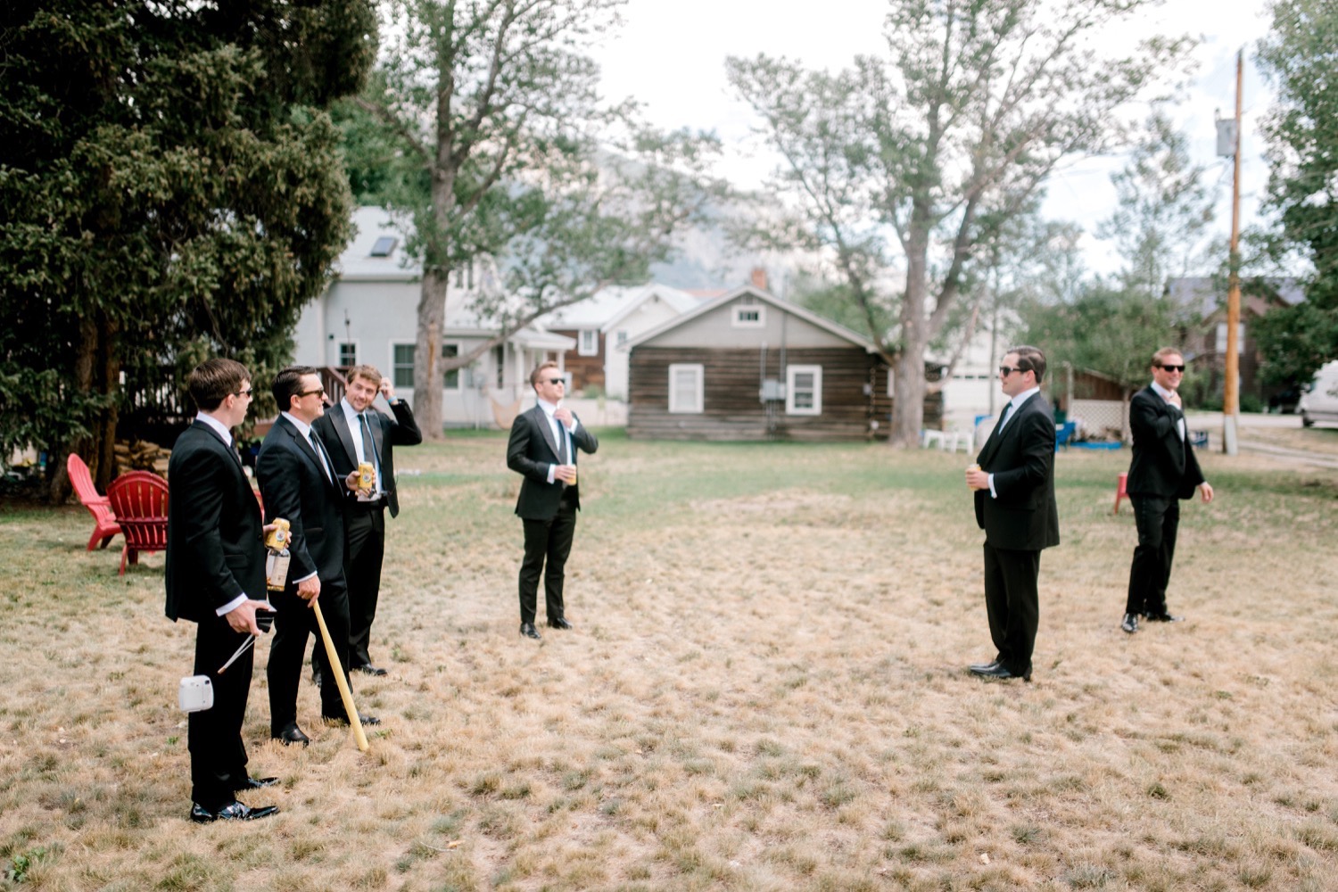groomsmen playing baseball crested butte wedding