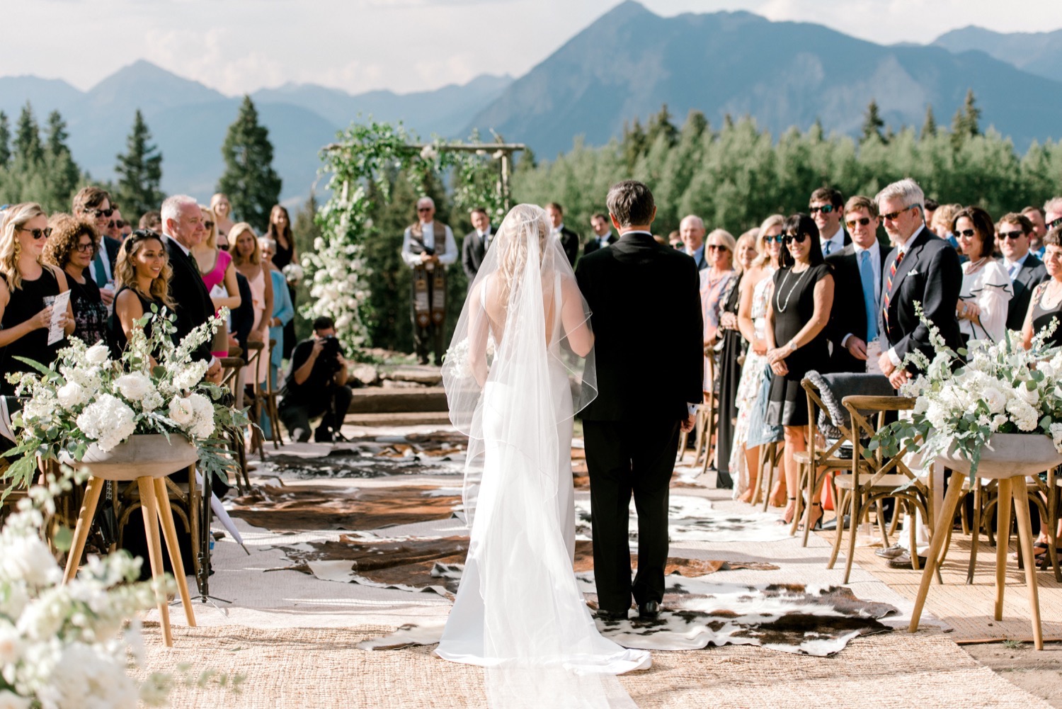 bride and dad walking down the aisle crested butte wedding