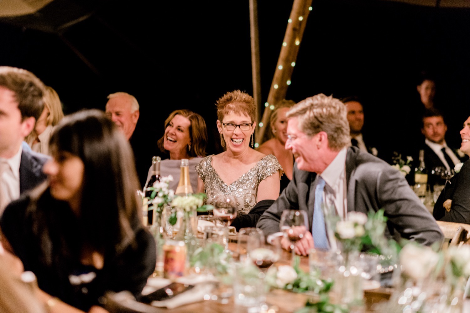 guests laughing at speech crested butte wedding