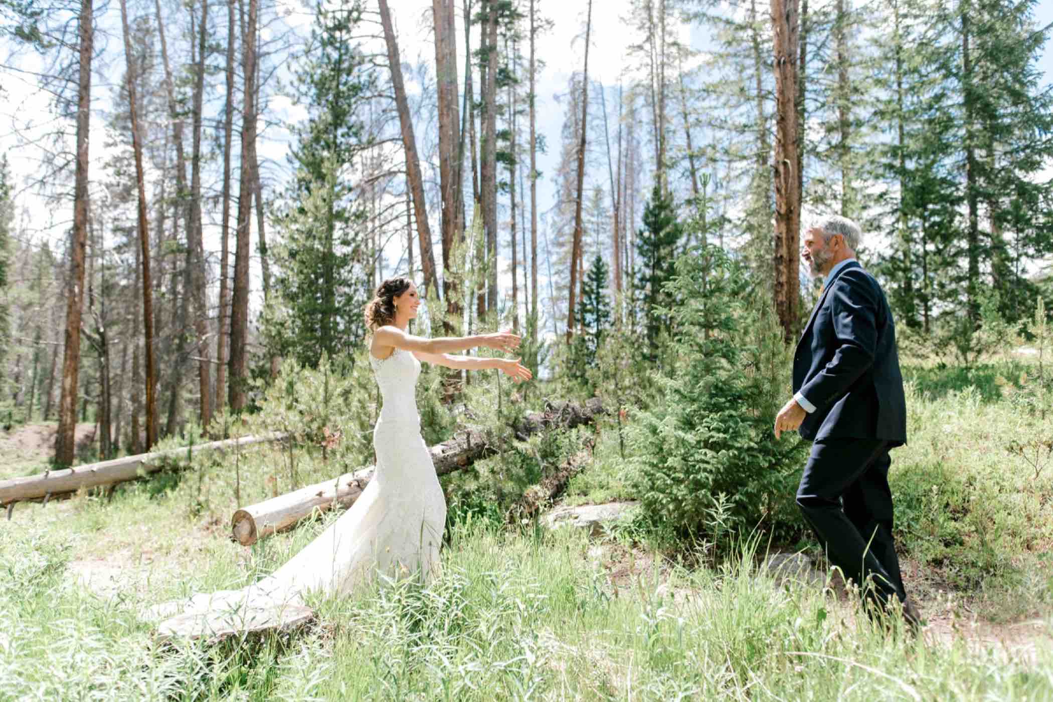 Bride sees her father for the first time before her wedding at Piney River Ranch in Vail, Colorado. Photo by Ali and Garrett, Romantic, Adventurous, Nostalgic Wedding Photographers.