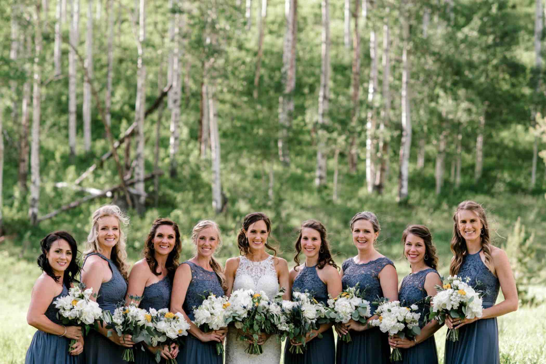 Bride and bridesmaid photos outside Piney River Ranch in Vail in the Colorado Rocky Mountains. Photo by Ali and Garrett, Romantic, Adventurous, Nostalgic Wedding Photographers.