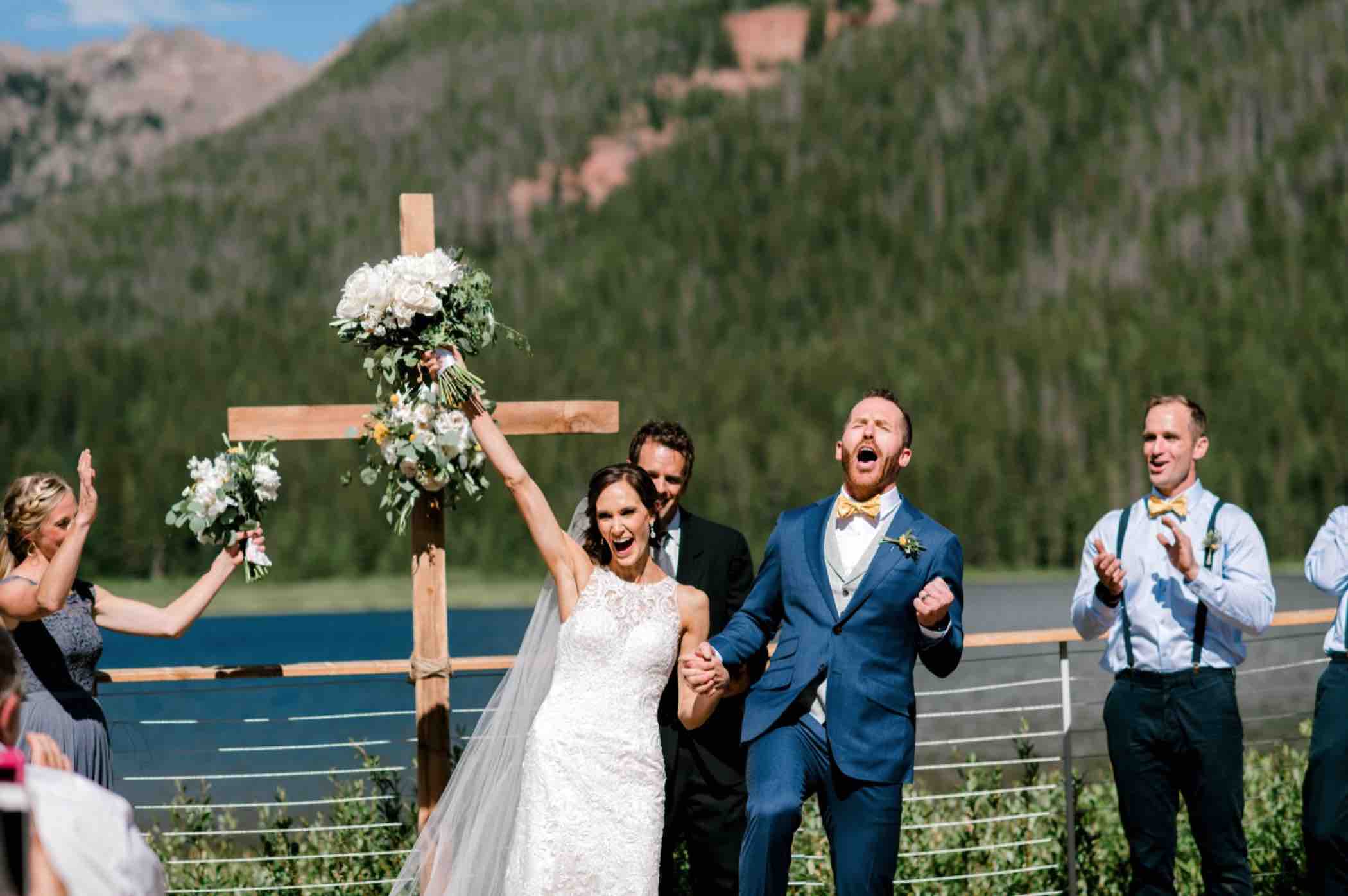 Kris and Sallie, bride and groom, celebrate their wedding ceremony at Piney River Ranch in Vail, Colorado.