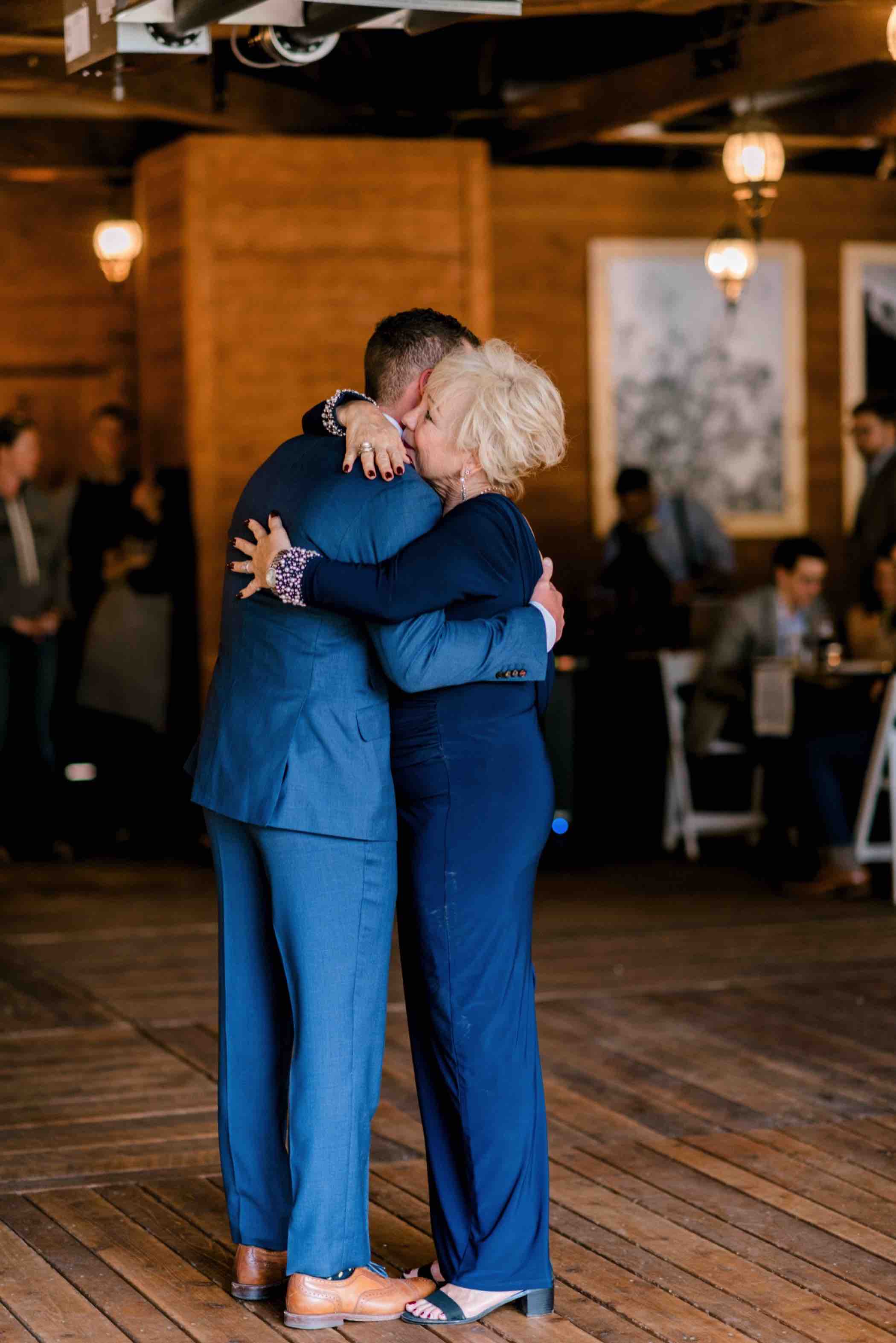 Mother son dance at Piney River Ranch in Vail, Colorado. Photo by Ali and Garrett, Romantic, Adventurous, Nostalgic Wedding Photographers.