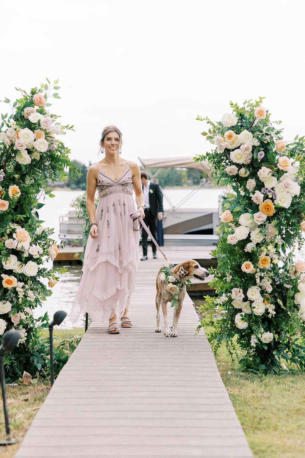 Dog Walking Down Pier at Private Estate Wedding Ceremony