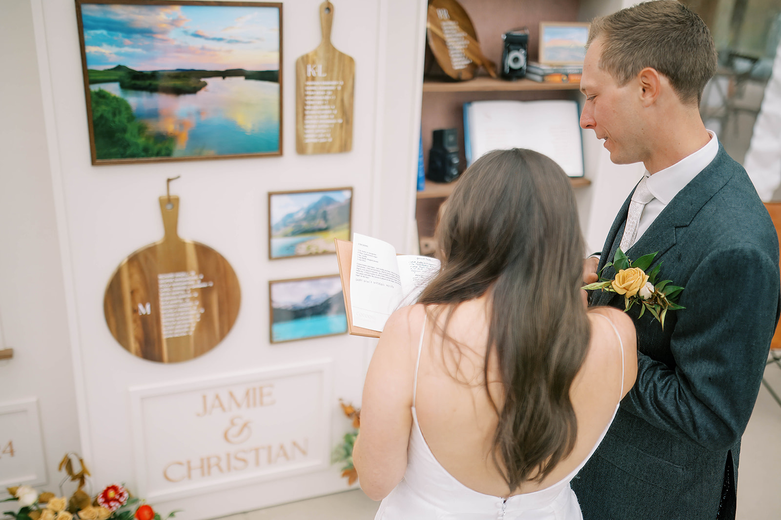 Couple Reading Guest Book at Colorado Ranch Wedding